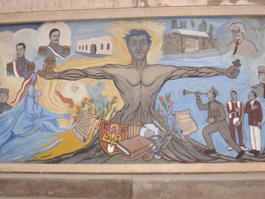 Mural histórico en pared del colegio